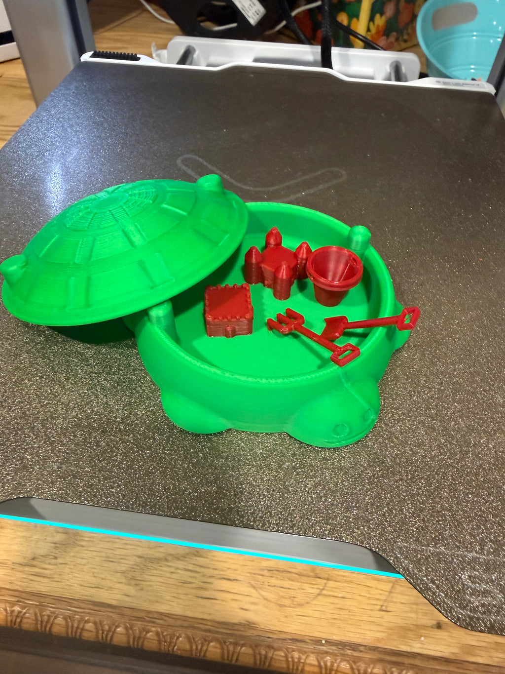 Mini turtle sandbox with beach toys